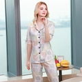 Women's satin short sleeve pajamas set with tropical leaf print and long pants - M / Top And Bottom / Leaf