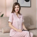 Pink silk satin pajama set for women featuring short sleeve top and long pants - L / Top And Bottom / Dusty Rose Sun Flower