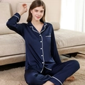 Women's dark blue satin silk pajamas set with white lace trim and button-up long sleeves - M / Top And Bottom / Navy Blue