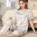 Women's cream satin pajama set featuring delicate pink floral prints and silk texture - M / Apricot White Primrose