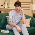 Men's light blue silk pajama set with maple leaf patterns and short sleeves - L / Top And Bottom / Light Blue