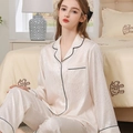 Women's light pink silk pajamas set featuring long sleeve button-up top and jacquard texture - Light Beige - Women