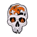 Halloween enamel pin featuring skull with graveyard scene in black white and orange - Grave Scene Skull Style (xz6812)