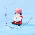 Miniature sitting Santa Claus resin ornament with pink heart detail, 5.1cm height - No. 19 Santa Holding Heart