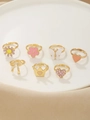 7pcs gold-finish children's ring set featuring daisy, butterfly, and crown charms - Gold Purple Daisy Heart Style