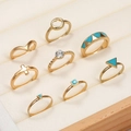 9-piece gold ring set with turquoise stones and heart shapes in a beige velvet box - Gold Heart Cross Geometric Style
