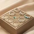 Set of 9 silver kids rings featuring teal enamel accents and sparkling crystals - Silver Geometric Blue-Green Style