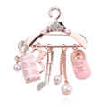 Spilla a gruccia oro rosa con borsa da golf rosa, scarpe, fiocco e perle lucenti - Appendiabiti