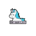 Detail of unicorn enamel pin with Don't Dream It Do It slogan on white background - Light Blue Unicorn