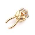 Golden tooth brooch with a sparkling rhinestone crown design on a white background - Tooth Brooch / Gold