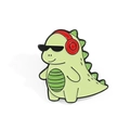 Cartoon green dinosaur enamel pin with sunglasses and headphones on white background - Green Trendy Music Dinosaur Style (xz2076)