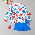 Costume da bagno due pezzi per bambino con maniche lunghe, stampa a fiocchi e pantaloncini - 4Y / Bianco Con Stampa Rossa E Blu