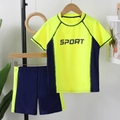 Two-piece boys' swimwear set featuring a fluorescent yellow and navy blue sport design - Yellow