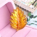 Leaf brooch in orange yellow finish with rhinestones in a pink velvet jewelry box - Gold Yellow