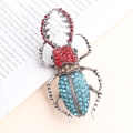 Vintage stag beetle brooch with colorful rhinestones in an antique silver finish - Blue