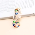 Vintage golden seahorse brooch with multi-color enamel, white pearls and sparkling rhinestones - Khaki