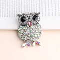 Sparkling owl safety pin brooch with multi-colored rhinestones and silver metal finish - Silver