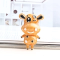 Cartoon Kuh-Brosche in orangefarbener Emaille mit Goldlegierung und Marmorstruktur - Orange