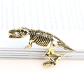 Broche dinosaure rétro en alliage doré avec structure osseuse détaillée pour mode créative - Or
