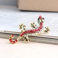 Broche lézard gecko doré avec cristaux rouges et AB étincelants pour vêtements chic - Petit Rouge