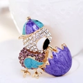 Macro view of crystal encrusted hatching chick brooch with enamel shell details - Purple Teal Chick (Style 8)