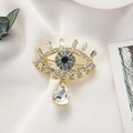 Καρφίτσα Evil Eye σε χρυσό με λαμπερά κρύσταλλα και μεγάλο κρυστάλλινο μενταγιόν - Χρυσό