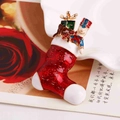 Broche chaussette de Noël avec casse-noisette en émail coloré et finition dorée - Rouge