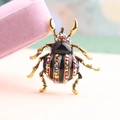 Creative beetle insect brooch with colorful rhinestones and black enamel in gold finish - Red AB