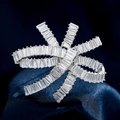 Elegant silver-toned bow ring featuring baguette-cut zircon stones on a blue silk background - 3D Bow Style (TB168 White) / Silver White