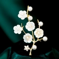 Elegant gold branch brooch with shell flowers and pearls on green velvet background - Plum Blossom Shell Style (TB657)