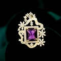 Macro shot of purple rectangular gemstone and gold sunflower setting with small zircons - Purple (TD024)