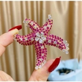 Elegante broche de estrella de mar dorada con circonitas rosa y blancas - Estilo Estrella de Mar Rojo Rosa (TB182)