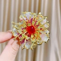 Exquisite floral brooch with red gemstone and multi-color zircon stones in gold plating - Red