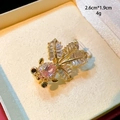 Exquisite Goldfisch-Brosche in Gold mit rosa Edelstein und Zirkonia-Mikropavé - Rosa Goldfischstil (B845)