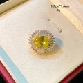 Elegant oval yellow crystal ring with double halo pavé diamonds in luxury jewelry box - Yellow
