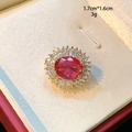 Macro detail of oval ruby red ring with zircon halo and 1.7cm by 1.6cm dimensions - Oval Style (D147) / Red