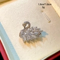 Detailed close-up macro view of silver crystal swan brooch pin with 1.9cm size and 3g weight - Mini Transparent Crystal Swan Style (D050)