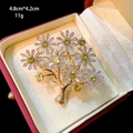 Detailed view of zirkon flower brooch in gold finish showing 4.8cm by 4.2cm dimensions - Light Yellow Crystal Flower Tree Style (B367)