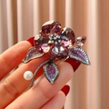 Elegant purple crystal flower brooch with freshwater pearl and sparkling stones detail - Purple Crystal Floral Style (B1738)