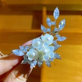Elegant floral brooch with natural shell petals, white pearls and sparkling cubic zirconia - Natural Shell Style (B415)