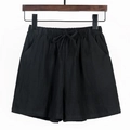 Women's loose-fit cotton crinkle shorts in black with drawstring elastic waist - Black