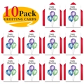 Detailansicht von 10er-Pack Geburtstagskarten mit Aquarellballons und roten Umschlägen - Aquarell-Ballon-Stil
