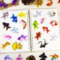 Vibrant colorful goldfish PET sticker set on notebook for creative scrapbooking decor - Goldfish Collection (T01042974)