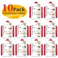 Flat lay of 10 Christmas cards with cat illustrations and red envelopes on white background - Cat Illustration Style (T020400627)