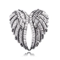 Vintage silver angel wings heart brooch with sparkling rhinestones on white background - C938-B