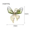 Eleganter grüner Schmetterlings-Brosche mit Gold-Filigran und funkelnden Strasssteinen - Smaragdgrün