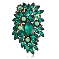 Detailed view of vintage crystal floral brooch with green gemstones and gold-plated alloy - Dark Green (Gold Base)