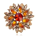 Exaggerated vintage flower brooch with large red crystal and amber petals in gold - Amber (B316-G)