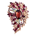 Close-up of vintage gold brooch featuring a large oval purple gem and amethyst rhinestones - Gold Purple Crystal (B312-G)