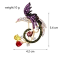 Detailed view of phoenix brooch showing 5.4cm size dimensions and inlaid rhinestones - Ag058-a